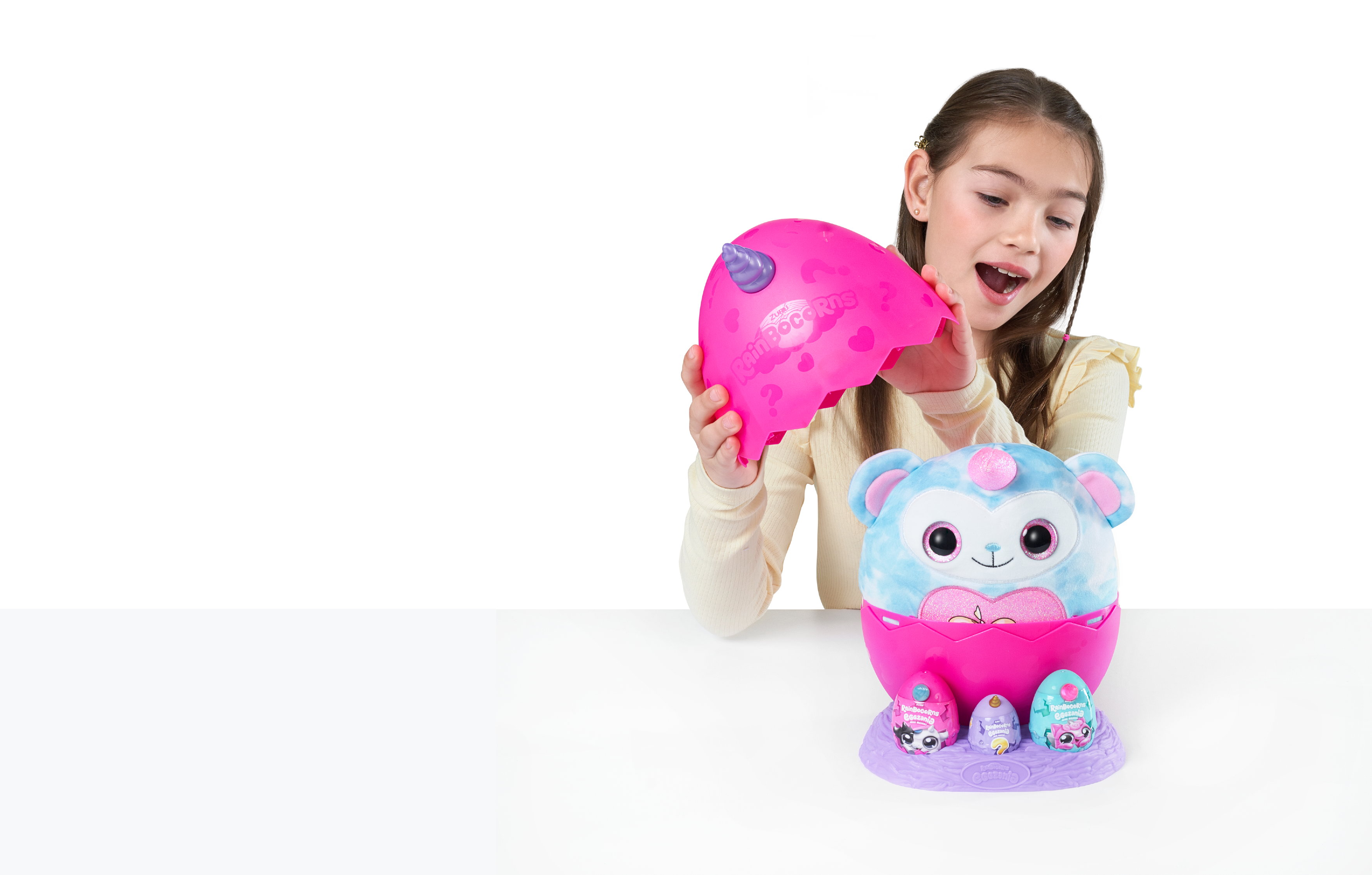 Rainbocorns Eggzania Mini Mania Series 1 Surprise Plush Toy for Girls Ages 3+, Collectible Stuffed Animal with 10+ Surprises, Slime, Stickers & Wearable Jewelry