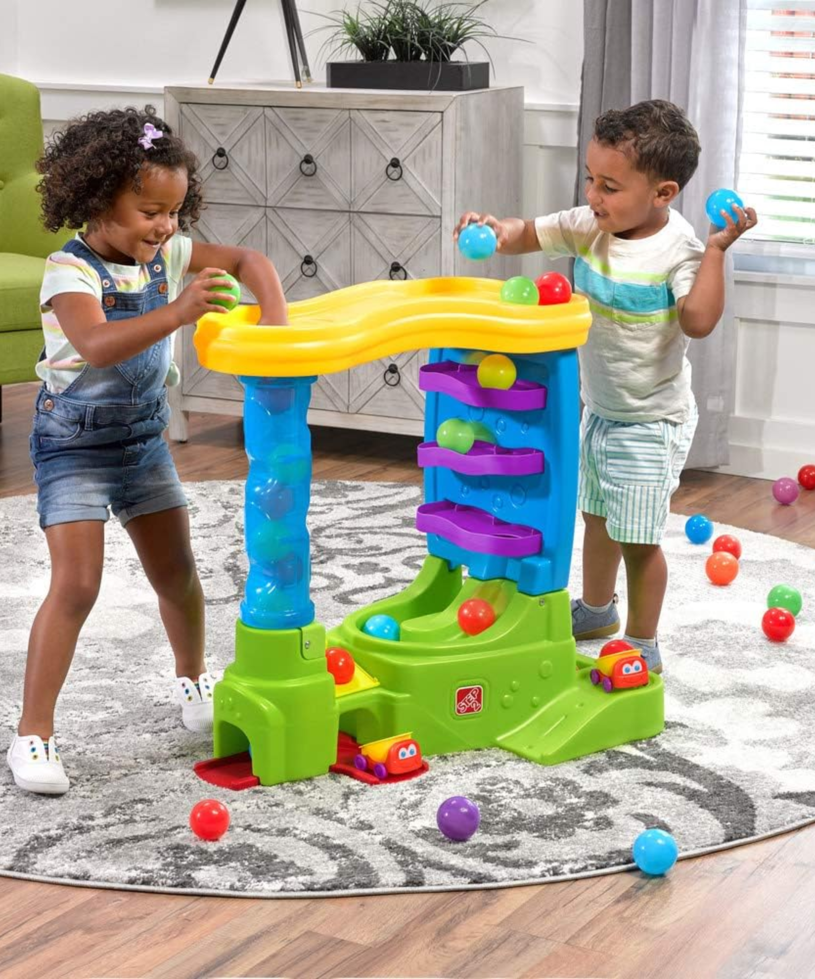 طاولة لعب حسية داخلية وخارجية من ستيب 2 بول باديز دبل دروب إتش كيو، لعبة نشاط مع 12 قطعة من الملحقات بما في ذلك الكرات ولعبة STEM ومركز الأنشطة، مناسبة للأولاد والبنات من عمر سنة فما فوق