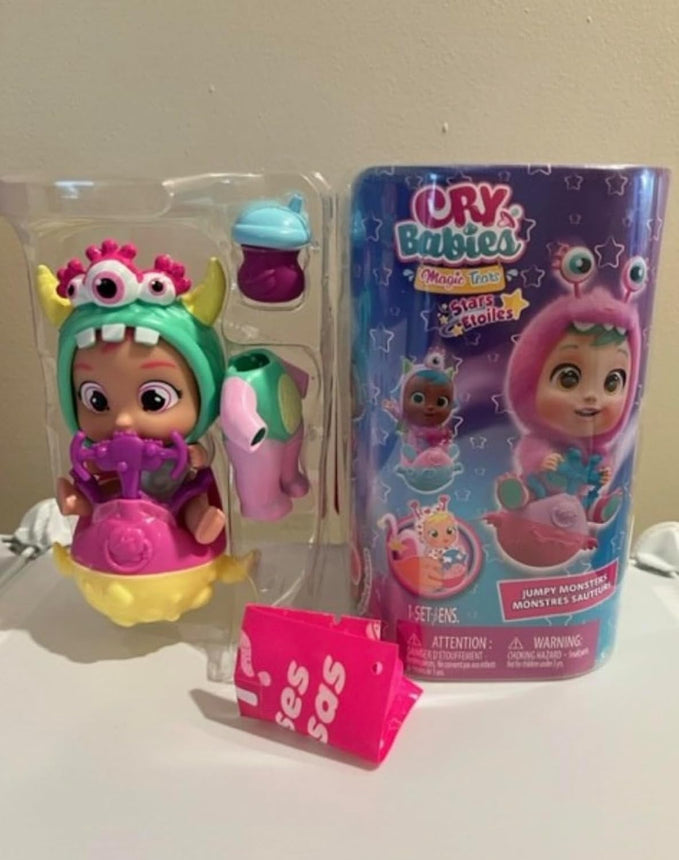 IMC Toys CRY Babies Zippy Mini Baby Doll with Monster Pyjamas, Tears, Slime and Jumping with Her Scooter, for Boys and Girls from 3 Years