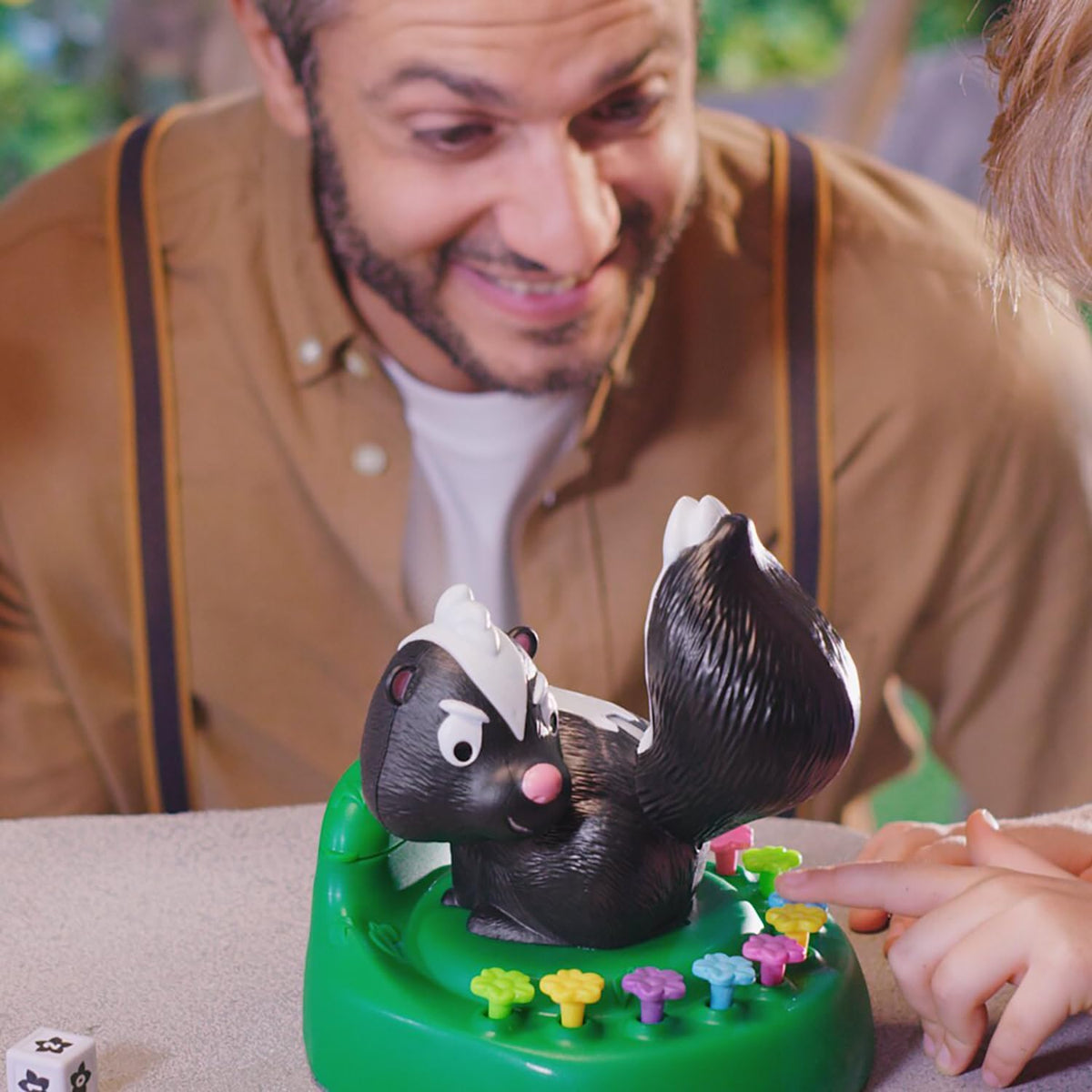 Merchant Ambassador Skunned! Kids Dice Rolling and luck game! Funny Surprise Water Spray! Kids action game!Age 6 & Above! Girls and Boys