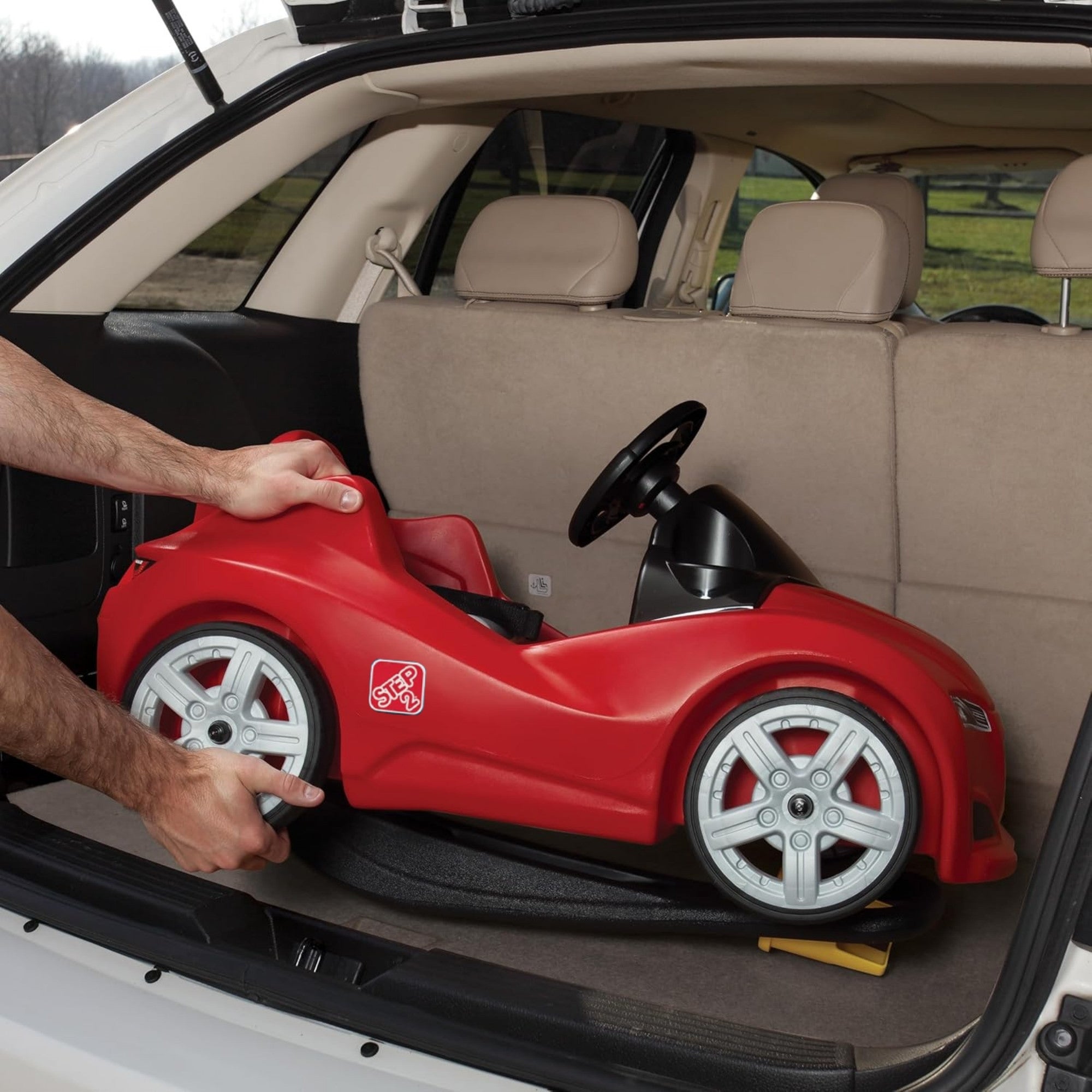 Step2 Whisper Ride Cruiser, Single Seater Kids Push Car, Easy to Store Ride On Toy with Seatbelt, Horn and Storage Trunk, Suitable for Children both Boys and Girls Aged 18m+, Blue, Pink, Red, Grey
