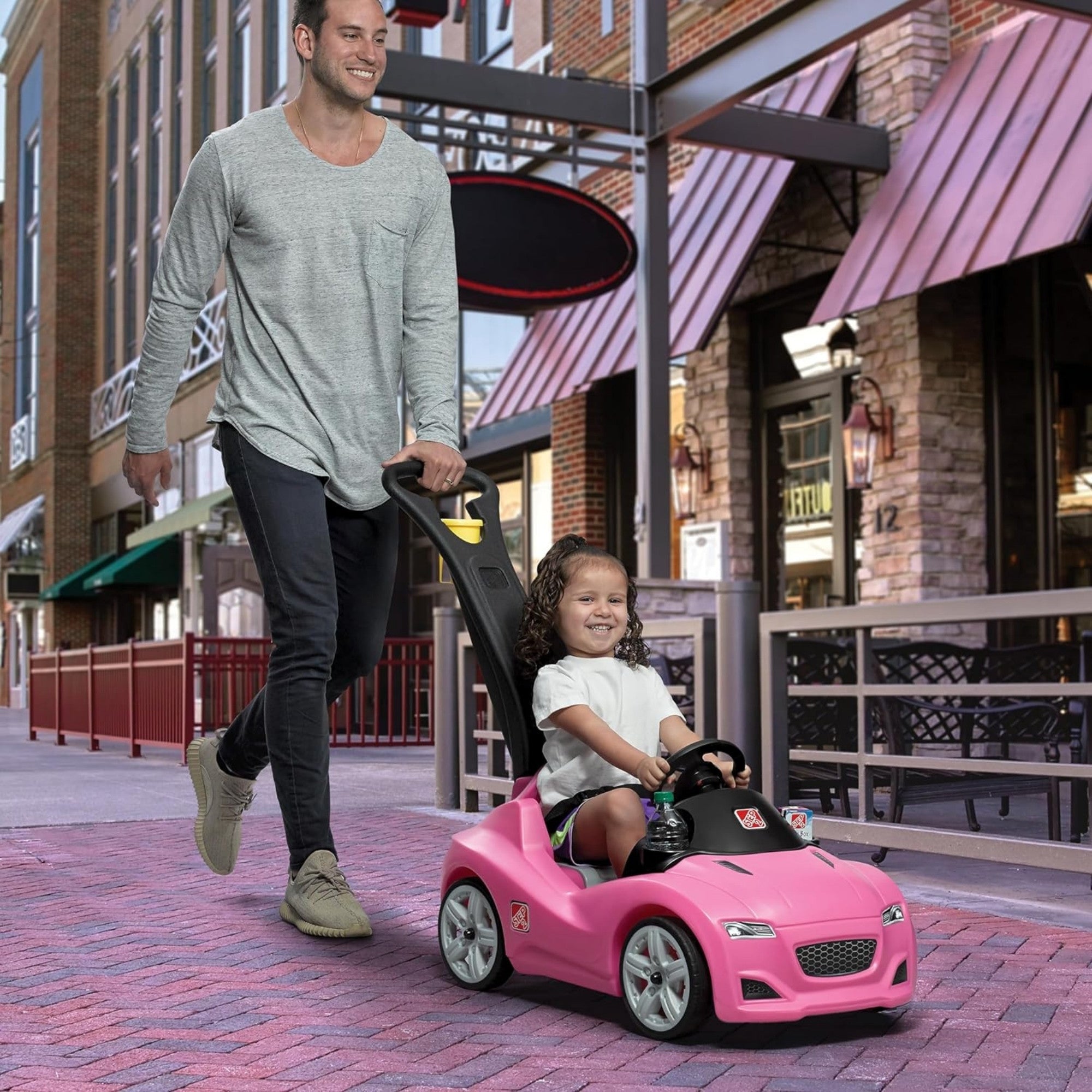 Step2 Whisper Ride Cruiser, Single Seater Kids Push Car, Easy to Store Ride On Toy with Seatbelt, Horn and Storage Trunk, Suitable for Children both Boys and Girls Aged 18m+, Blue, Pink, Red, Grey