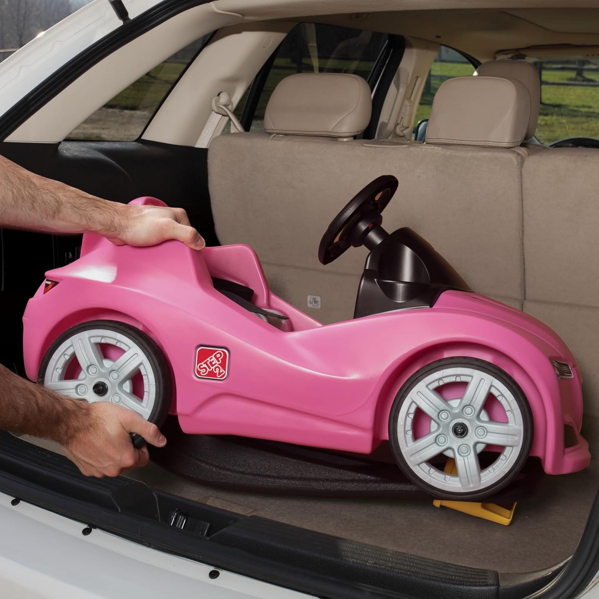 Step2 Whisper Ride Cruiser, Single Seater Kids Push Car, Easy to Store Ride On Toy with Seatbelt, Horn and Storage Trunk, Suitable for Children both Boys and Girls Aged 18m+, Blue, Pink, Red, Grey
