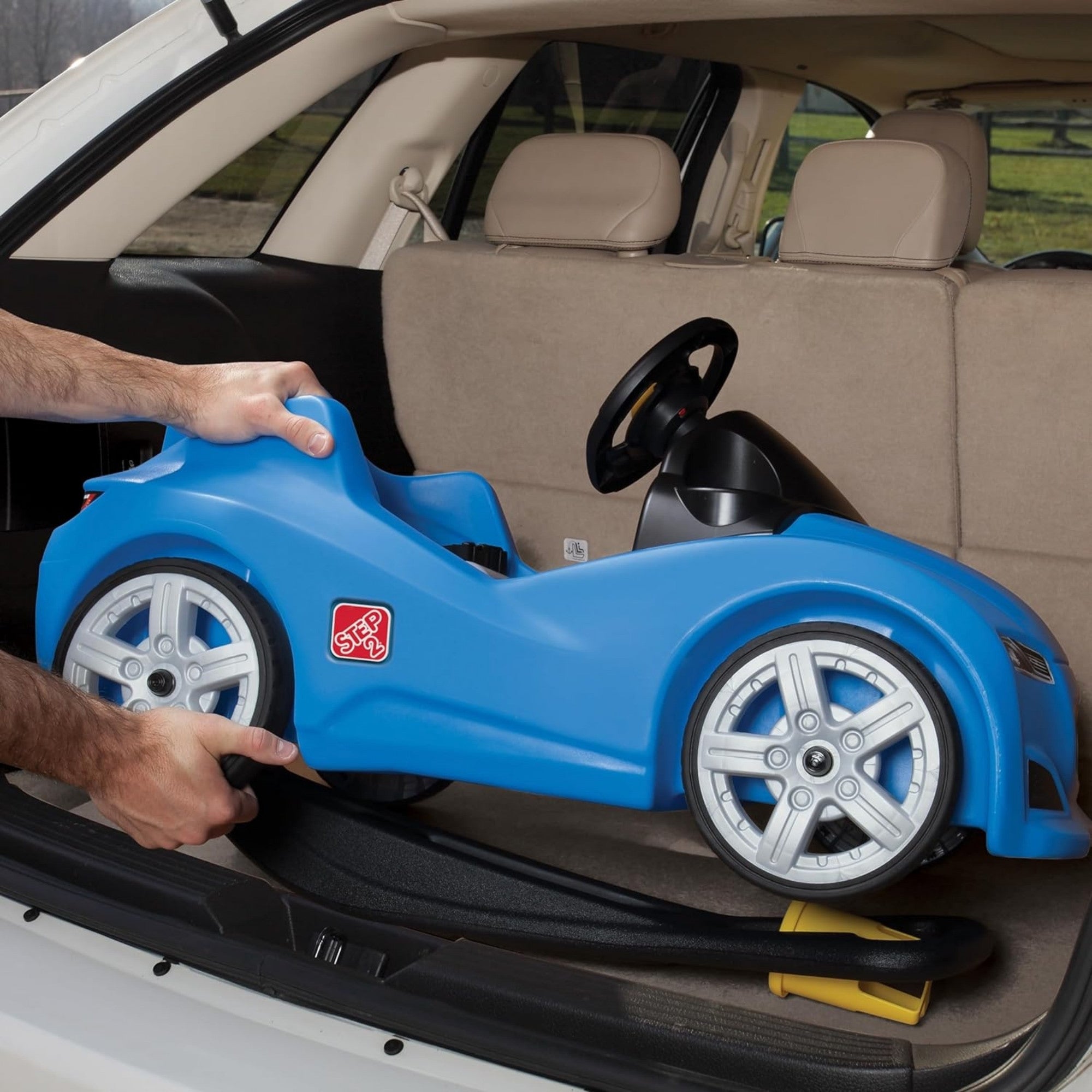 Step2 Whisper Ride Cruiser, Single Seater Kids Push Car, Easy to Store Ride On Toy with Seatbelt, Horn and Storage Trunk, Suitable for Children both Boys and Girls Aged 18m+, Blue, Pink, Red, Grey