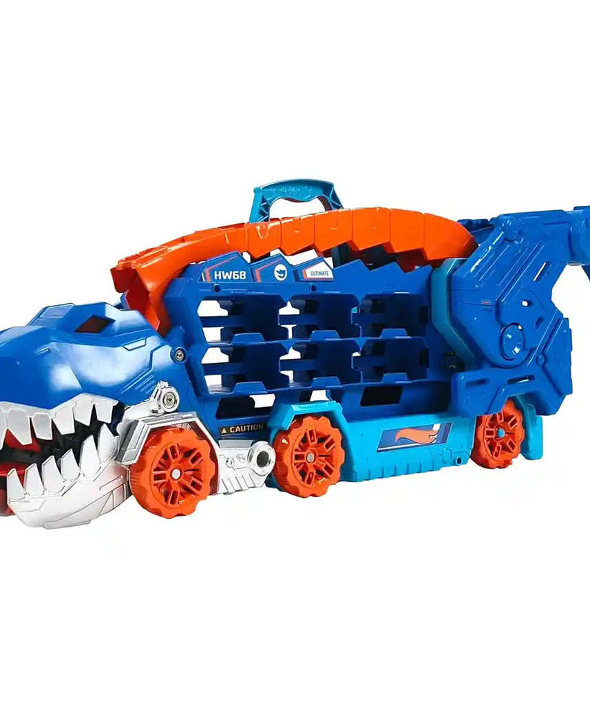 Hot Wheels City Ultimate Hauler T Rex Dinosaur Transporter, Transforms into Dino with Race Track, Stores 20+ 1:64 Die Cast Cars, Lights and Sounds, Includes 2 Cars, Kids Toy Playset, 4+ Years