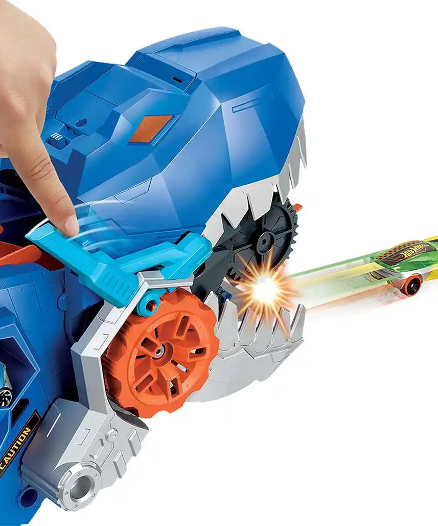 Hot Wheels City Ultimate Hauler T Rex Dinosaur Transporter, Transforms into Dino with Race Track, Stores 20+ 1:64 Die Cast Cars, Lights and Sounds, Includes 2 Cars, Kids Toy Playset, 4+ Years