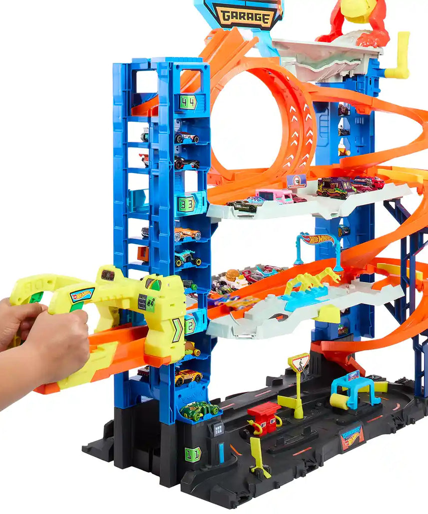 Hot Wheels City Mega Garage Playset, Four-Level Track Set with Corkscrew Elevator, Storage for 60+ Vehicles, Connection Points and 1 Hot Wheels Car, Kids Toys for Ages 4 and Up