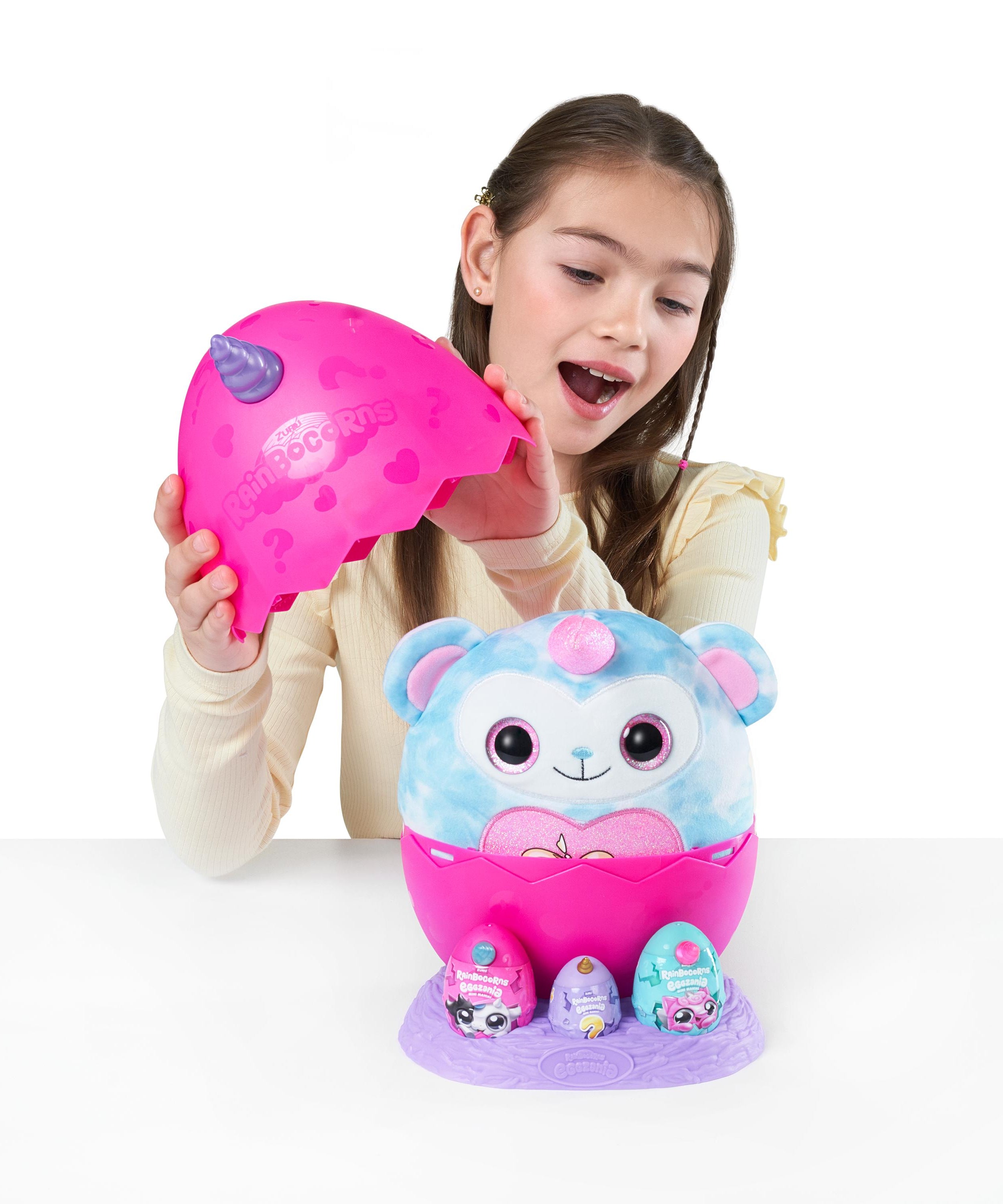 Rainbocorns Eggzania Mini Mania Series 1 Surprise Plush Toy for Girls Ages 3+, Collectible Stuffed Animal with 10+ Surprises, Slime, Stickers & Wearable Jewelry