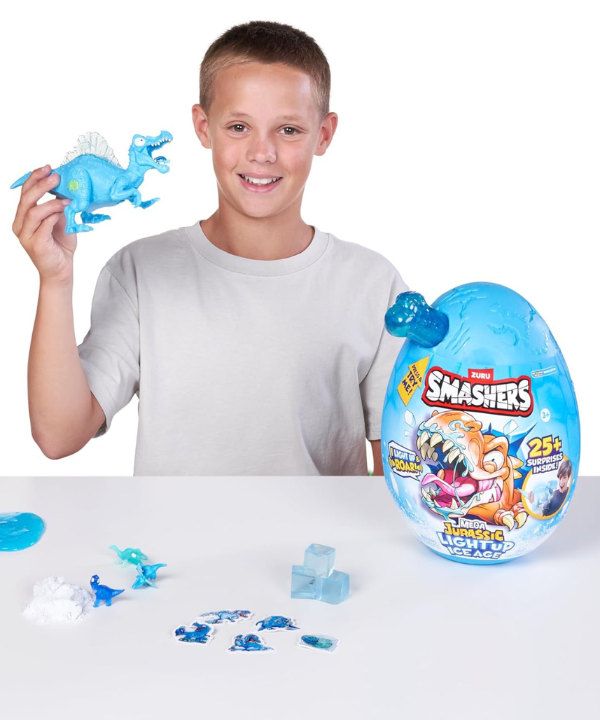 Smashers Mega Jurassic Light Up Ice Age Spinosaurus Dino Egg Toy with 25 Surprises Slime Sand Glow Features Roaring Sound Effects Collectible Dinosaur Build Kit for Kids 3+