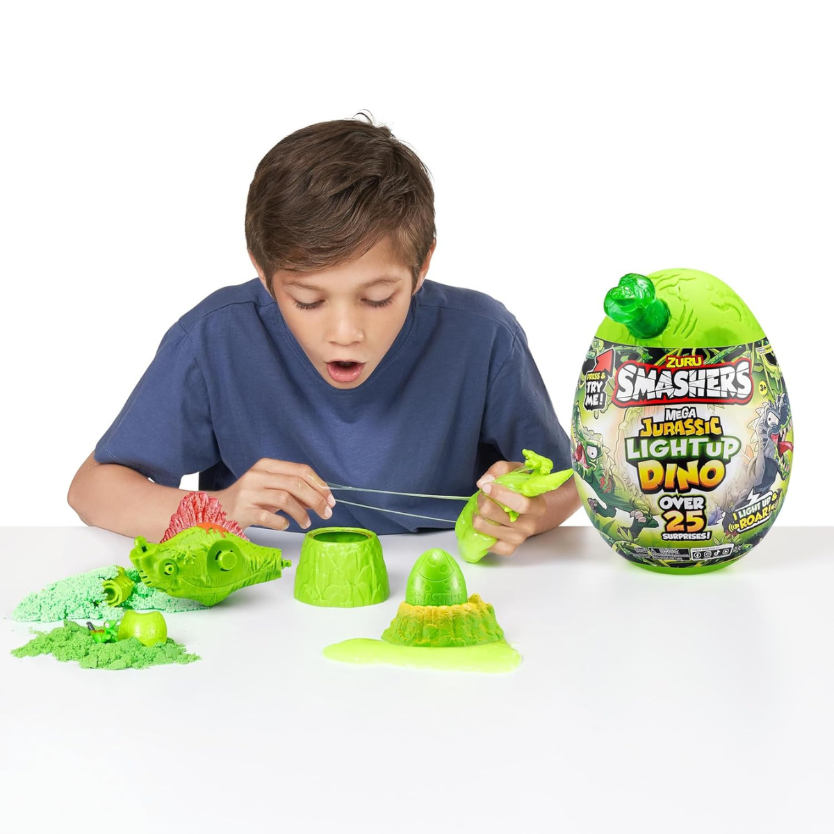 Zuru Smashers Mega Dino Combo Pack Dino Island and Jurassic Light Up Dino Egg with 25+ Surprises Slime Sand Foam Mini Eggs Buildable Dinosaurs Light Up and Roaring Features Collectible Toy Playset for Kids 5+