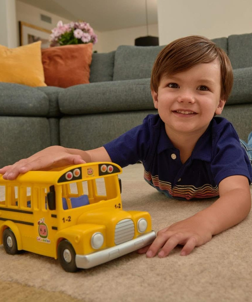 CoComelon Musical Yellow School Bus with JJ Figure, Light-Up & Sound Vehicle Toy, Wheels on the Bus Song, Battery Powered, Ages 2+