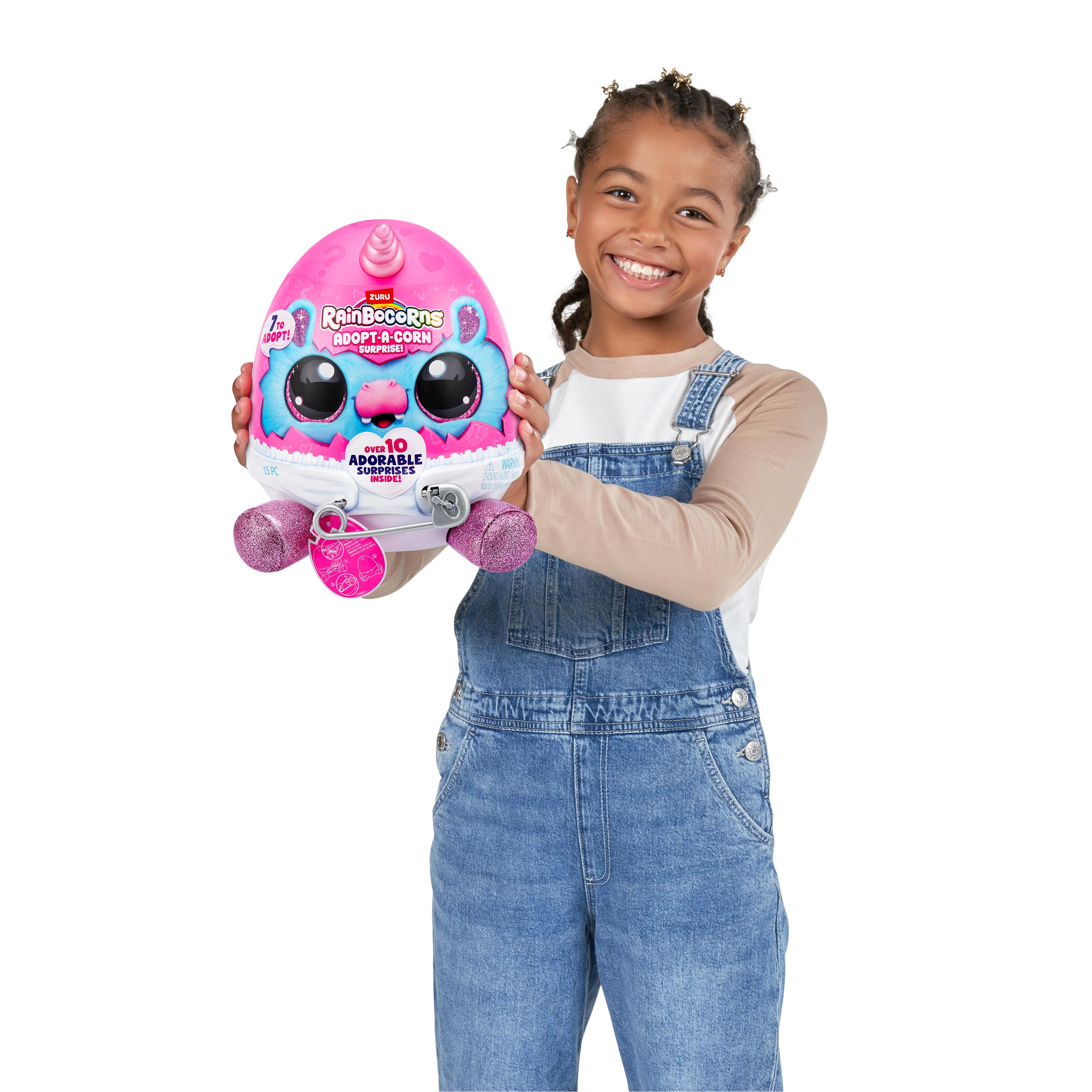 Rainbocorns Adopt-A-Corns Baby Plush Assorted Newborn Surprise Toy with 15+ Surprises, Diaper Egg, Pacifier & Adoption Certificate, Collect All 7 Cute Characters, Gift for Girls Ages 3+