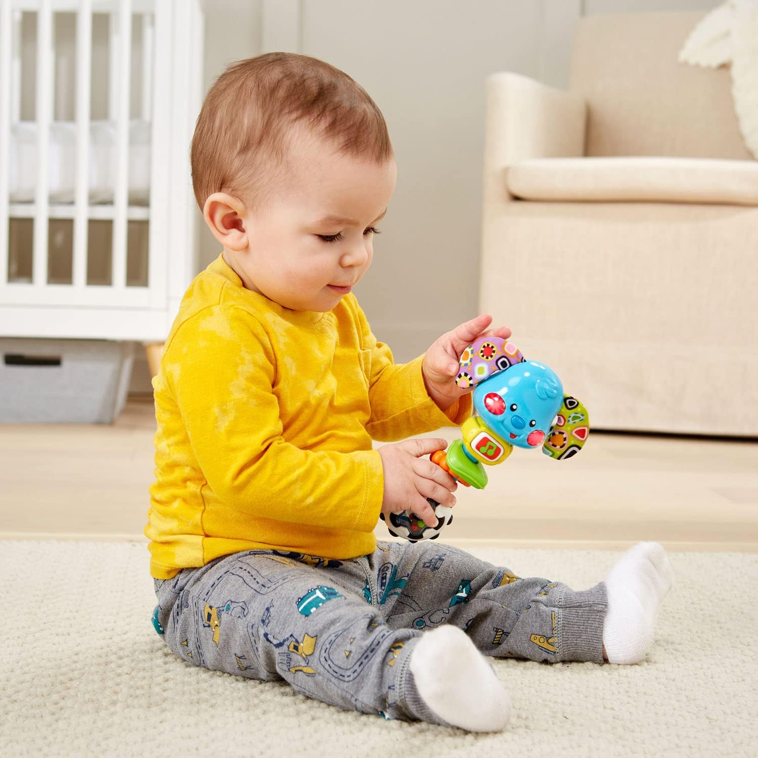 VTech Rattle and Sing Puppy Baby Musical Rattle with Lights Sounds and Textures Multicolour 3–36 Months