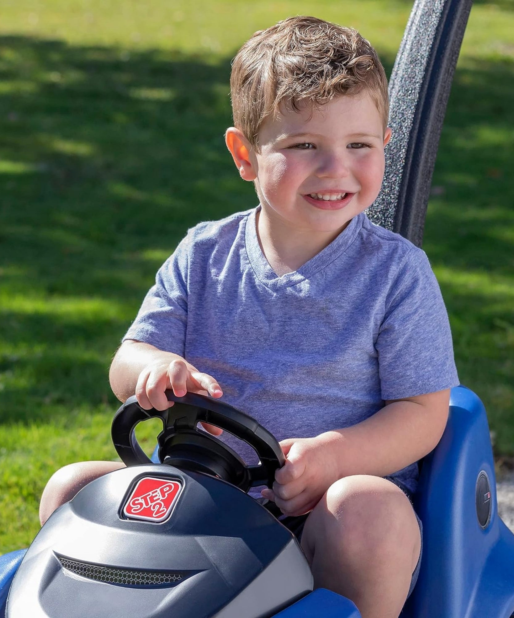 Step2 Buggy GT, Single Seater Kids Push Car, Easy to Store Ride On Toy with Seatbelt, Horn and Storage Trunk, Suitable for Children both Boys and Girls Aged 18m and Above, Blue