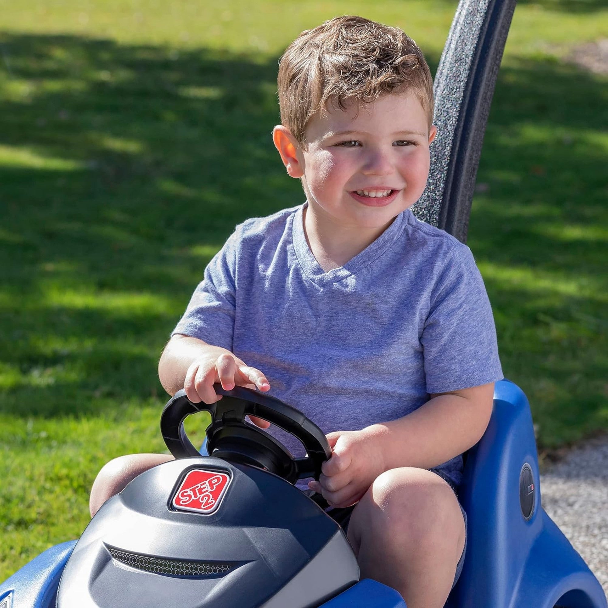 Step2 Buggy GT, Single Seater Kids Push Car, Easy to Store Ride On Toy with Seatbelt, Horn and Storage Trunk, Suitable for Children both Boys and Girls Aged 18m and Above, Blue