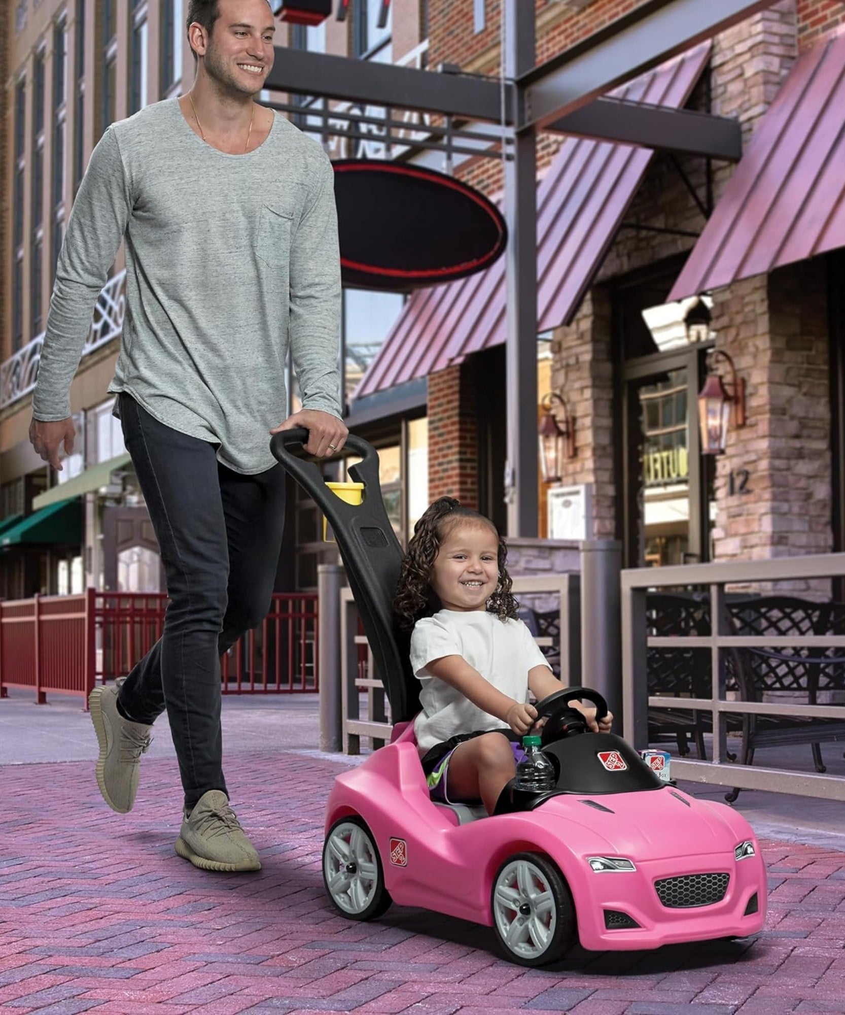 Step2 Whisper Ride Cruiser, Single Seater Kids Push Car, Easy to Store Ride On Toy with Seatbelt, Horn and Storage Trunk, Suitable for Children both Boys and Girls Aged 18m+, Blue, Pink, Red, Grey