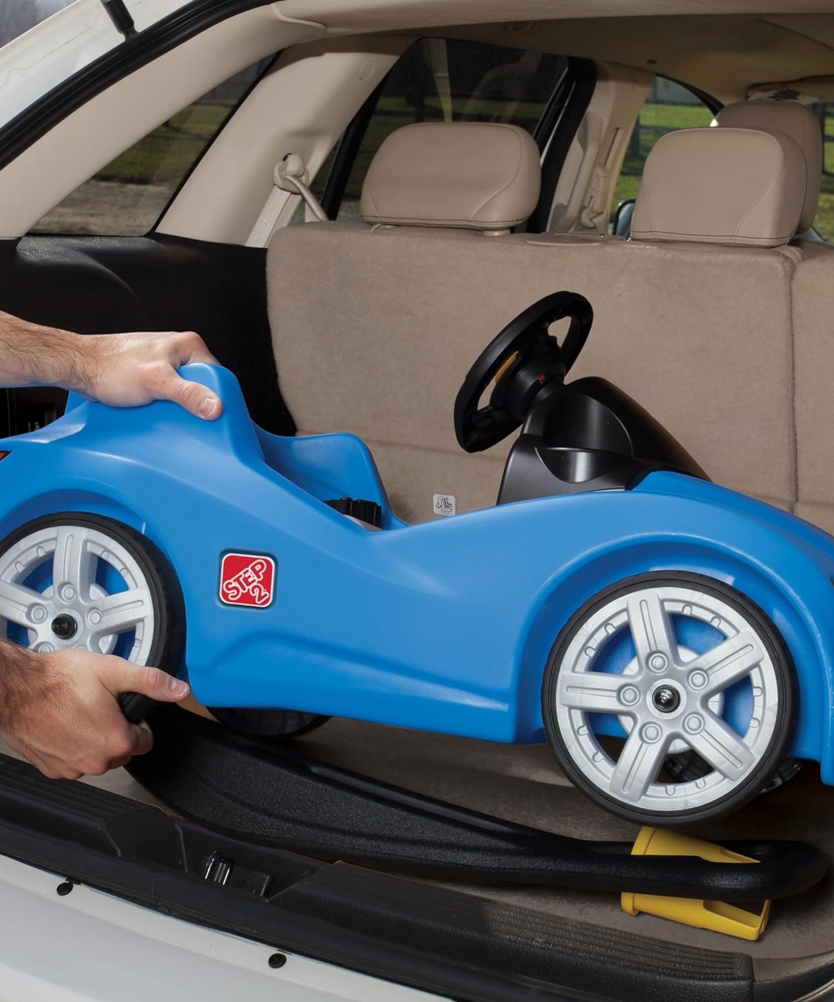 Step2 Whisper Ride Cruiser, Single Seater Kids Push Car, Easy to Store Ride On Toy with Seatbelt, Horn and Storage Trunk, Suitable for Children both Boys and Girls Aged 18m+, Blue, Pink, Red, Grey