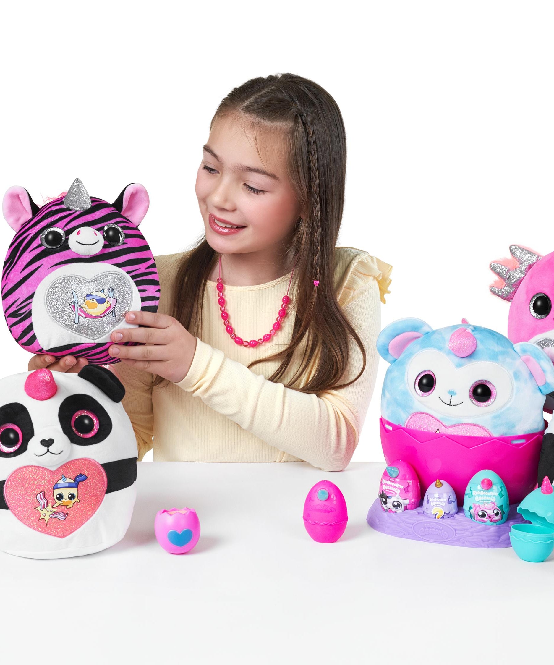 Rainbocorns Eggzania Mini Mania Series 1 Surprise Plush Toy for Girls Ages 3+, Collectible Stuffed Animal with 10+ Surprises, Slime, Stickers & Wearable Jewelry