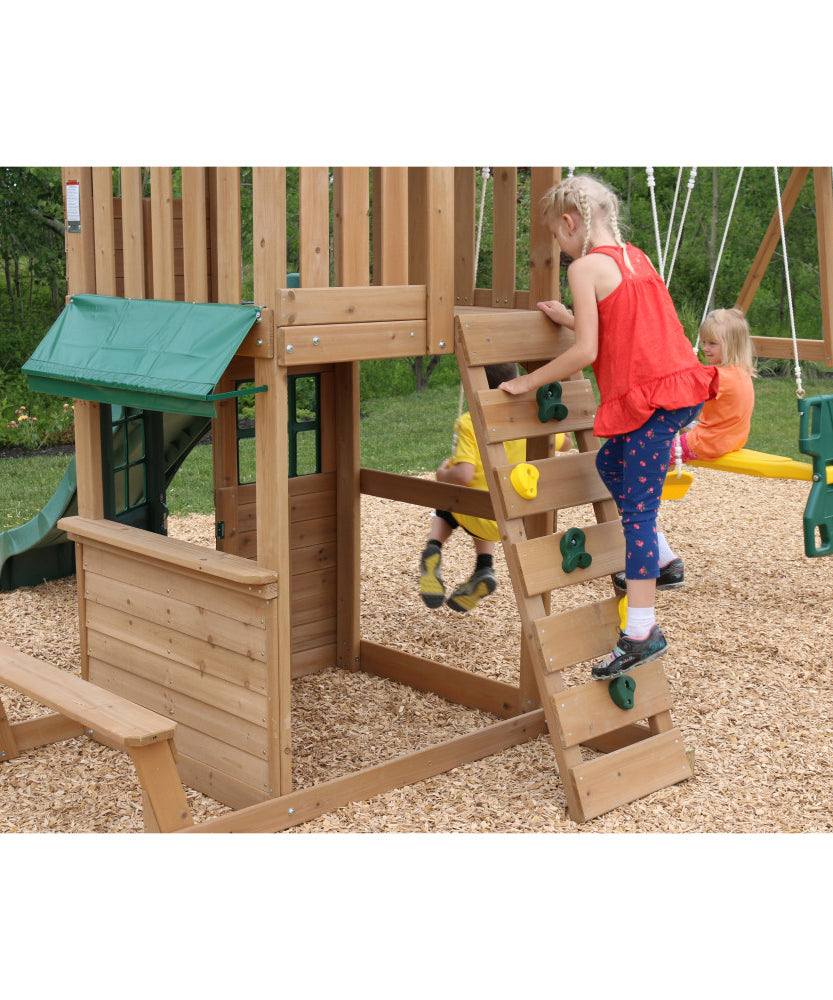 KidKraft Windale Fort Wooden Outdoor Swing Set, Playset with Clubhouse, Swings, High-Rail Wave Slide, Glider, Shaded Café Table and Bench, Multi-Level Backyard Play for Kids Ages 3 to 10