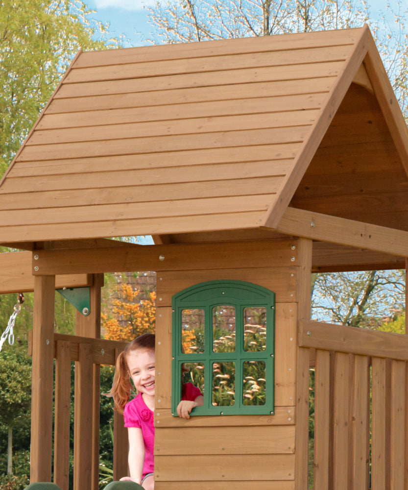 KidKraft Windale Fort Wooden Outdoor Swing Set, Playset with Clubhouse, Swings, High-Rail Wave Slide, Glider, Shaded Café Table and Bench, Multi-Level Backyard Play for Kids Ages 3 to 10