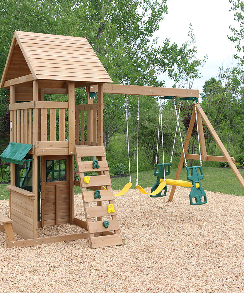 KidKraft Windale Fort Wooden Outdoor Swing Set, Playset with Clubhouse, Swings, High-Rail Wave Slide, Glider, Shaded Café Table and Bench, Multi-Level Backyard Play for Kids Ages 3 to 10
