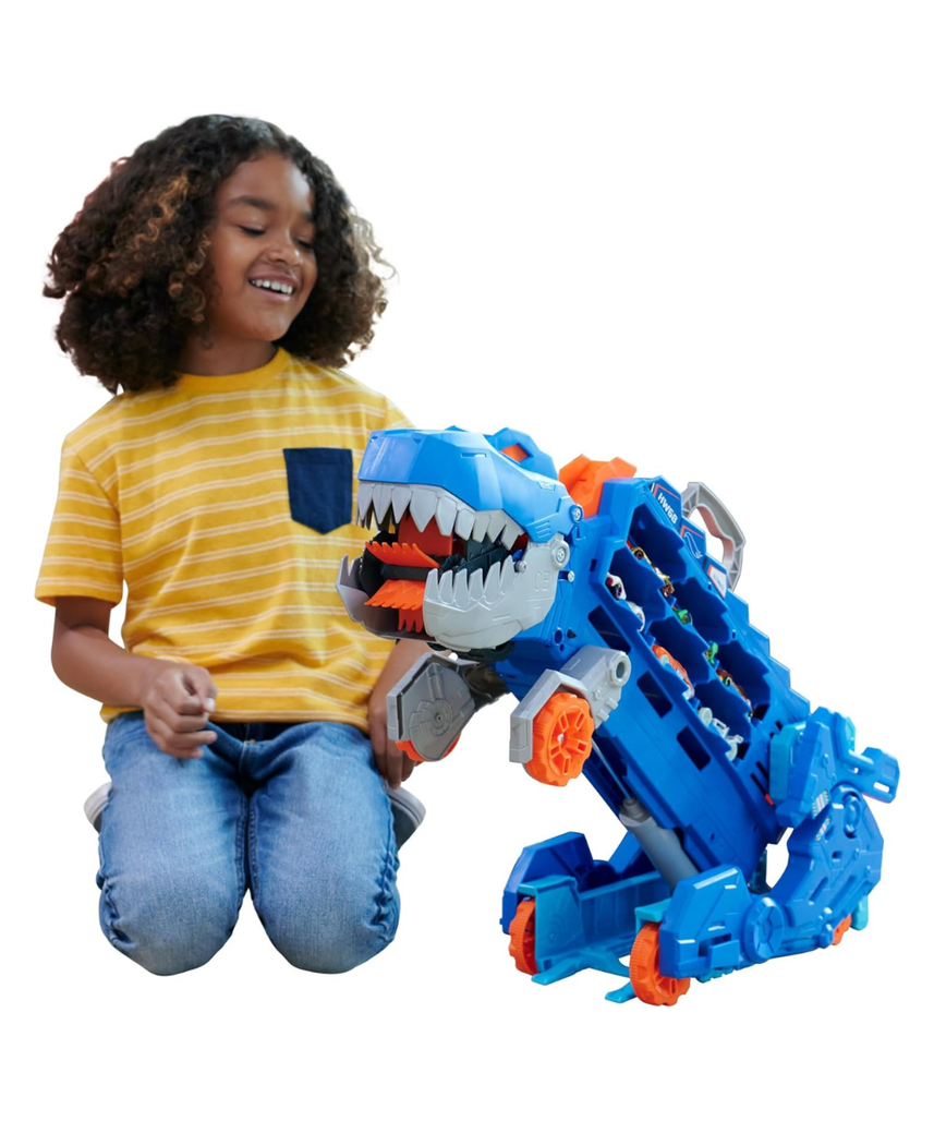 Hot Wheels City Ultimate Hauler T Rex Dinosaur Transporter, Transforms into Dino with Race Track, Stores 20+ 1:64 Die Cast Cars, Lights and Sounds, Includes 2 Cars, Kids Toy Playset, 4+ Years