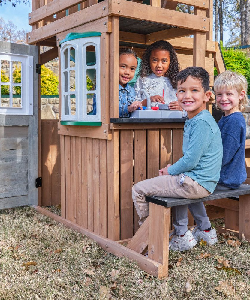 KidKraft Panorama Tower Outdoor Playhouse, 3-Story Wooden Playhouse with Rock Wall, Tunnel Slide, Kitchen and Crow’s Nest